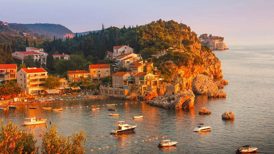 Pržno cove with fishing boats in golden evening light