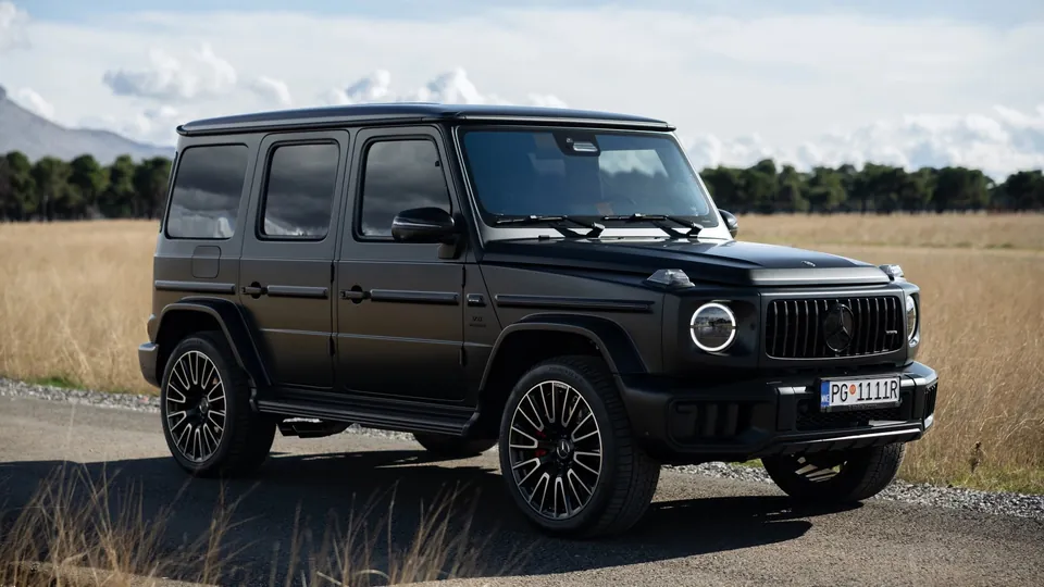 Black SUV on a wide open plain