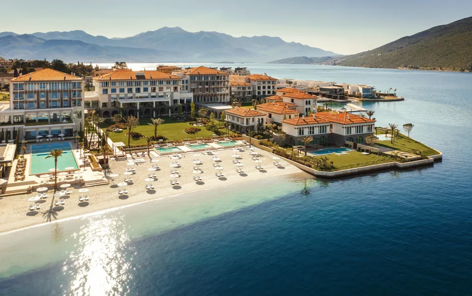 The resort, its beach and the bay seen from the air