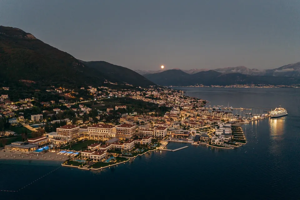 Aerial view of the marina village under a full moon